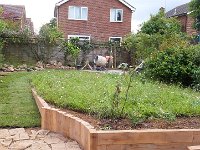 Work is starting on the new rear patio and the pathway is turfed.